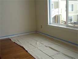 Preparation with drop cloths and blue painter's tape